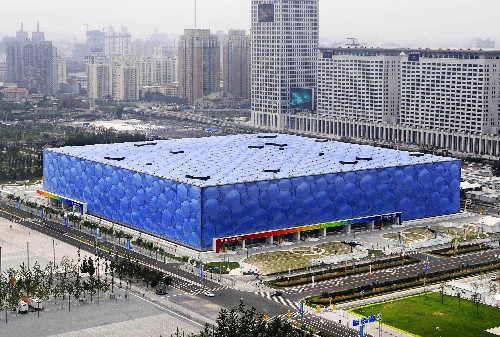 Beijing's Olympic swimming venue, the Water Cube, incorporated structures drawn from nature such as bubbles and coral. It's designers described it as a bundle of fun. [Li Ziheng/Xinhua] 