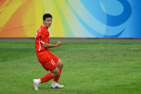 Dong Fangzhuo of China celebrates after a goal during the Beijing Olympic Games men's football Group C first round match against New Zealand at Shenyang Olympic Stadium in Olympic co-host city Shenyang, capital of northeast China's Liaoning Province, Aug. 7, 2008. China and New Zealand played out a 1-1 draw in the match on Thursday.(Xinhua/Xie Huanchi)
