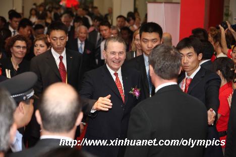 International Olympic Committee (IOC) President Jacques Rogge (C) attends the opening of Olympic Expo Beijing 2008 in Beijing Exhibition Center in Beijing, capital of China, Aug. 8, 2008. [Zhang Yanhui/Xinhua] 