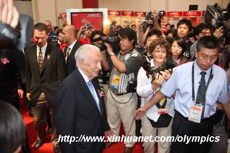 International Olympic Committee (IOC) Honorary President Juan Antonio Samaranch (C) attends the opening of Olympic Expo Beijing 2008 in Beijing Exhibition Center in Beijing, capital of China, Aug. 8, 2008. [Zhang Yanhui/Xinhua]