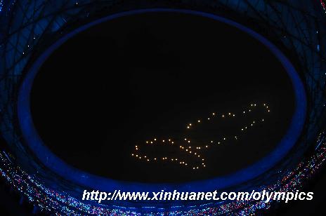 Photo taken on Aug. 8, 2008 shows the footprints fireworks named the “Footprints of History”, symbolizing the pace of the successive summer Games, during the opening ceremony of the Beijing Olympic Games held in the National Stadium, also known as the Bird's Nest, in north Beijing, China. (Xinhua/Li Ga)