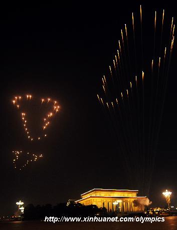 Photo taken on Aug. 8, 2008 shows the fireworks named the 'Footprints of History', symbolizing the pace of the successive summer Games, in the sky during the opening ceremony of the Beijing Olympic Games held in the National Stadium, also known as the Bird's Nest, in Beijing, China. [Zou Zheng/Xinhua] 