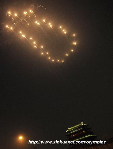 Photo taken on Aug. 8, 2008 shows the footprints fireworks named the 'Footprints of History', symbolizing the pace of the successive summer Games, during the opening ceremony of the Beijing Olympic Games in Beijing, China. [Wang Qingqin/Xinhua]