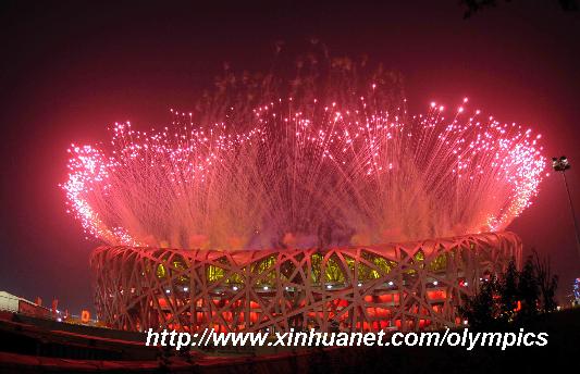 Photo taken on Aug. 8, 2008 shows the fireworks of the opening ceremony of the Beijing Olympic Games held in the National Stadium, also known as the Bird's Nest, in north Beijing, China. [Gaesang Dawa/Xinhua] 