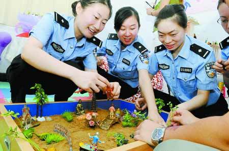 Police enjoy kids' play to ease tension