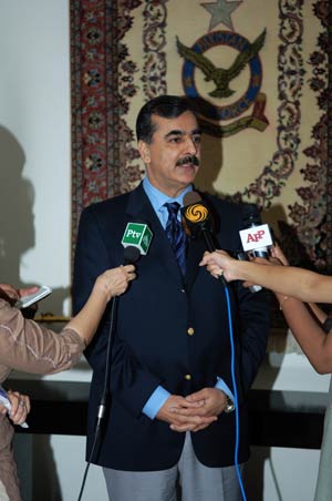 Pakistani Prime Minister Yousuf Raza Gillani is interviewed at the Chaklala airbase on the outskirts of Islamabad, capital of Pakistan, Aug. 7, 2008. Yousuf Raza Gillani on Thursday left Islamabad for Beijing to attend the opening ceremony of the Beijing 2008 Olympic Games. (Xinhua Photo)