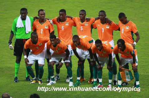 Players of Cote D'Ivoire pose for photos prior to the Beijing Olympic Games men's football Group A match between Cote D'Ivoir and Argentina at Shanghai Stadium.