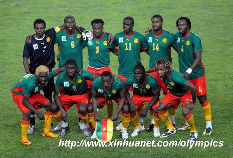 Members of Cameroon men's football team pose for picture before the Beijing Olympic Games men's football Group D first round match against South Korea in Qinhuangdao.