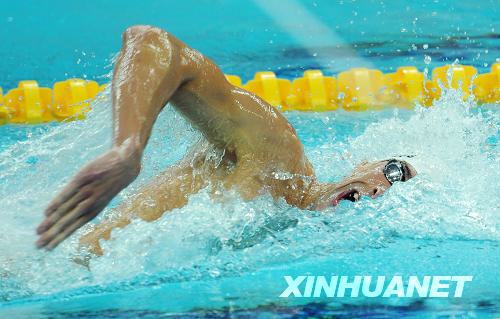 US swimmer Michael Phelps clocked 4:07.82 Saturday night in men's 400 meter individual medley, breaking the Olympic record of 4:08.26 set by himself in Athens. [Xinhua]