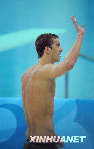 US swimmer Michael Phelps clocked 4:07.82 Saturday night in men's 400 meter individual medley, breaking the Olympic record of 4:08.26 set by himself in Athens. [Xinhua]