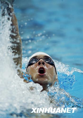 US swimmer Michael Phelps clocked 4:07.82 Saturday night in men's 400 meter individual medley, breaking the Olympic record of 4:08.26 set by himself in Athens. [Xinhua]