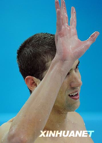 US swimmer Michael Phelps clocked 4:07.82 Saturday night in men's 400 meter individual medley, breaking the Olympic record of 4:08.26 set by himself in Athens. [Xinhua]