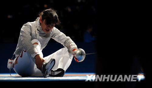 China's medal hopeful Tan Xue failed to enter top four Saturday, losing to Russia's Velikaya Sofiya 9-15 at the preliminaries of the women's sabre individual event of the Olympic Games.[Xinhua]
