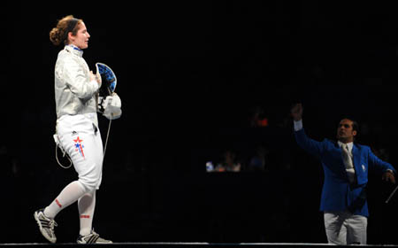 Sada Jacobson of the United States acts after defeating Sofiya Velikaya of Russia during the women's individual sabre semifinal 1 at the Beijing 2008 Olympic Games, in Beijing, China, Aug 9, 2008. [Xinhua] 