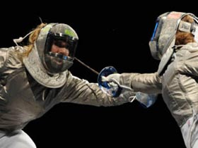 Zagunis(L) of the United States competes against her teammate Becca Ward during the women's individual sabre semifinal 2 at the Beijing 2008 Olympic Games, in Beijing, China, Aug 9, 2008. Zagunis beat Ward in the bout. [Xinhua]