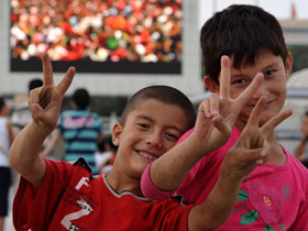 People all over China cheer for the opening of the Beijing Olympics