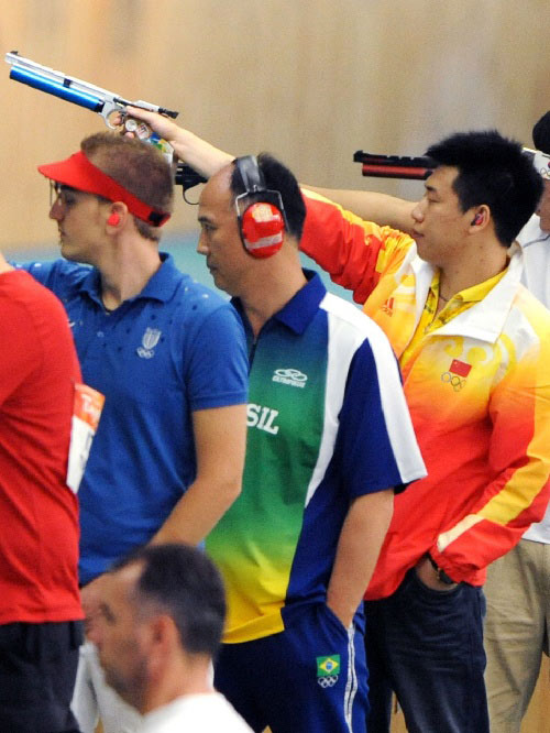 Pang Wei of China prepares to shoot during men's 10m air pistol qulification of Beijing Olympic Games at Beijing Shooting Range Hall in Beijing, China, August 9, 2008. Pang Wei won the gold medal in men's 10m air pistol final.