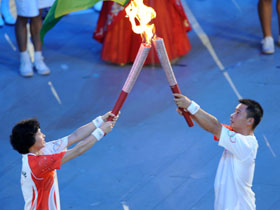 Olympic torch relay in the National Stadium during the Olympic opening ceremony