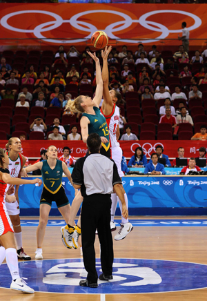 Players jump ball during women's basketball preliminary Rnd group A between Australia and Belarus at Beijing Olympic Basketball Gymnasium in Beijing, China, Aug. 9, 2008. [Xinhua] 