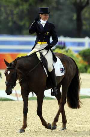 Australia's rider Lucinda Fredericks rides her horse Headley Britannia during eventing dressage competition held at Hong Kong Olympic Equestrian Venue (Sha Tin) in the Olympic co-host city of Hong Kong, south China, Aug. 9, 2008. 