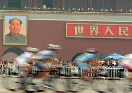 Riders pass the Tian'an Men Square during women’s road race of the Beijing 2008 Olympic Games in Beijing, China, August 10, 2008.