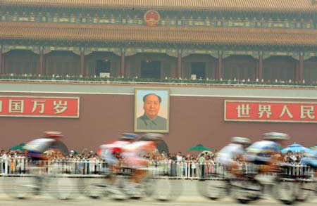 Riders pass the Tian'an Men Square during women’s road race of the Beijing 2008 Olympic Games in Beijing, China, August 10, 2008.