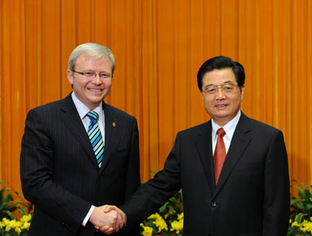 Chinese President Hu Jintao (R) shakes hands with Australian Prime Minister Kevin Rudd during their meeting in Beijing, China, Aug. 9, 2008. Kevin Rudd attended the opening ceremony of the Beijing Olympic Games on Friday night. (Xinhua/Fan Rujun) 