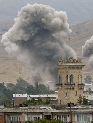 Smoke is seen over buildings after bombardment in Gori, 80 km (50 miles) from Tbilisi, August 9, 2008. 