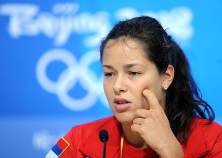 Tennis player Ana Ivanovic of Serbia attends a news conference to announce her withdrawal from the Olympic tennis event due to her injury in Beijing, China, Aug. 10, 2008. Ana Ivanovic is the world number one and newly-crowned French Open women's singles champion. (Xinhua/Xing Guangli) 