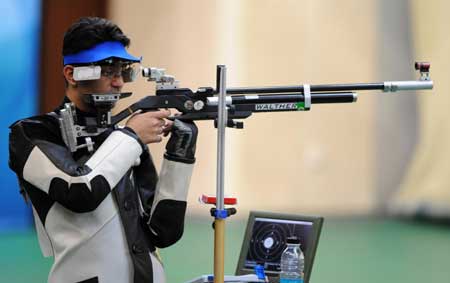 Abhinav Bindra scored 700.5 points to win the men's 10m air rifle at the Olympic Games here on Monday. [Xinhua] 