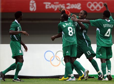 Players of Nigeria celebrate their win during Men's First Round Group B Match 11 between Nigeria and Japan of Beijing 2008 Olympic Games football event at TJ Olympic Center Stadium in Tianjin, an Olympic co-host city in north China, Aug. 10, 2008. Nigeria beat Japan 2-1. (Xinhua/Yang Zongyou)