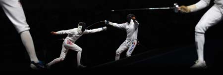 Sturla Torkildsen (L) of Norway competes against Matteo Tagliariol of Italy during men's individual epee round of 32 of Beijing 2008 Olympic Games fencing event at Fencing Hall of National Convention Center in Beijing, China, Aug. 10, 2008. Matteo Tagliariol of Italy qualified next round.