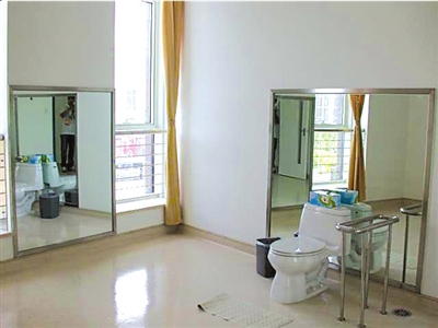 The urine testing laboratory is equipped with two huge mirrors.