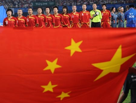 The starting lineup of China poses for a group photo during Women's First Round-Group E-Match 15 between China and Argentina of Beijing 2008 Olympic Games football event at QHD Stadium in Qinhuangdao, an Olympic co-host city in north China's Hebei Province, Aug. 12, 2008.