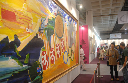 Visitors view the artworks displayed at the China International Exhibition Center in Beijing, capital of China, Aug. 11, 2008. The Olympic Fine Arts 2008, held by the International Olympic Committee (IOC), opened in Beijing Monday, displaying more than 800 works selected from about 10,000 works of more than 40 countries and regions. [Xinhua]