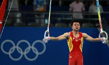 Chen Yibing performs in the Olympic men's gymnastics team competition. 
