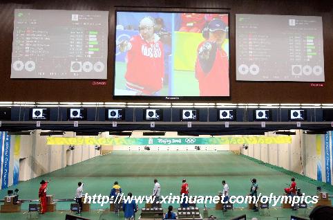 Shooters compete during men's 50m pistol final of the Beijing 2008 Olympic Games shooting event in Beijing, China, Aug 12, 2008. [Bao Feifei/Xinhua]