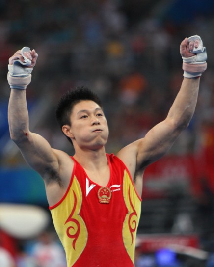 China's formidable male gymnasts stormed to a long-awaited Olympic team gold medal before an ecstatic home crowd on Tuesday. They claimed the title at 286.125 points, beating defending Olympic champion Japan to second place by a comfortable margin of 7.25 points. The United States took the bronze in 275.850 points. [Xinhua]