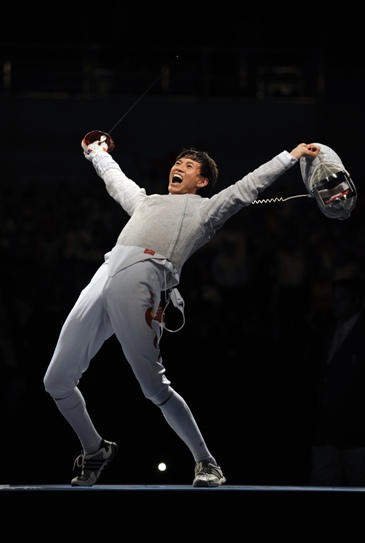 Chinese Zhong Man beat French Nicolas Lopez 15-9 to win the men's sabre fencing gold medal at the Olympic Games on Tuesday. It is China's first ever gold medal in fencing events. Romanian Mihai Covaliu downed Julien Pillet of France 15-11 for the bronze medal. [Xinhua]