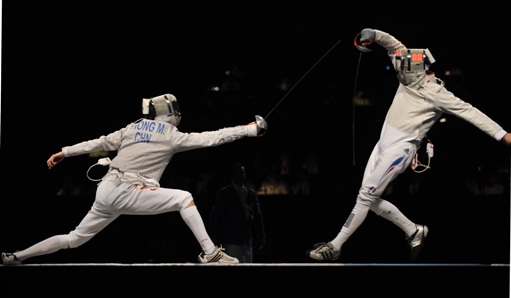 Chinese Zhong Man beat French Nicolas Lopez 15-9 to win the men's sabre fencing gold medal at the Olympic Games on Tuesday. It is China's first ever gold medal in fencing events. Romanian Mihai Covaliu downed Julien Pillet of France 15-11 for the bronze medal. [Xinhua]