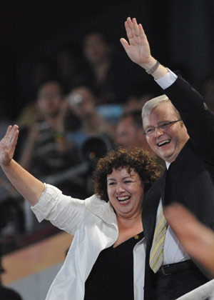 Australian Prime Minister Kevin Rudd (R) and his wife Therese Rein wave to the Olympic delegation of Australia at the opening ceremony of the Beijing Olympics in the National Stadium in north Beijing, China, Aug. 8, 2008. (Xinhua/Ma Zhancheng) 