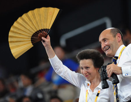 British Princess Anne Elizabeth Alice Louise (L) waves to the Olympic delegation of Britain at the opening ceremony of the Beijing Olympics in the National Stadium in north Beijing, China, Aug. 8, 2008. (Xinhua/Ma Zhancheng) 