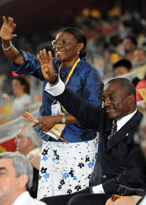 Togolese President Faure Gnassingbe (R) waves to the Olympic delegation of Togo at the opening ceremony of the Beijing Olympics in the National Stadium in north Beijing, China, Aug. 8, 2008. (Xinhua/Huang Jingwen) 