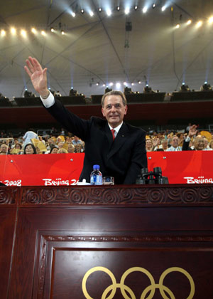 Jacques Rogge, president of the International Olympic Committee, waves during the opening ceremony of the Beijing Olympic Games in the National Stadium in north Beijing, China, on Aug. 8, 2008. (Xinhua/Huang Jingwen) 