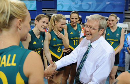 Australian Prime Minister Kevin Rudd (R) talks with Australian women's basketball players after their match agaist Belarussia during women's preliminary round group A of Olympic basketball event at Beijing 2008 Olympic Games at the Beijing Olympic Basketball Gymnasium in Beijing, China, Aug. 9, 2008. Australia beat Belarussia 83-64.(Xinhua/Li Jundong)