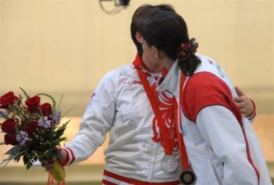 Natalia Paderina (left), the silver medalist from Russia, shared the medal podium with Nino Salukvadze from Georgia, who won bronze on August 10.