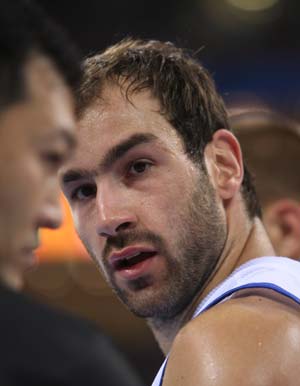 Vasileios Spanoulis (R) of Greece communicates to the judge during Men's Preliminary Round Group B-Game 21 between Germany and Greece of Beijing 2008 Olympic Games basketball event at the Beijing Olympic Basketball Gymnasium in Beijing, China, Aug. 12, 2008. Greece beat Germany 87-64.