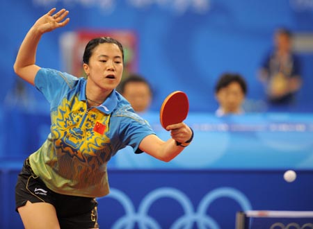 Wang Nan of China competes during the women's team group match against Andrea Bakula of Croatia at the Beijing 2008 Olympic Games table tennis event in Beijing, China, Aug. 13, 2008. China defeated Croatia 3-0. (Xinhua/Xu Yu)