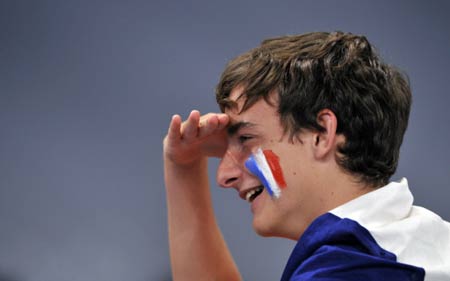 A French supporter attends the Men's individual Sabre tournament on August 12, 2008 at the Fencing Hall of National Convention center, as part of the 2008 Beijing Olympic games, Beijing, China.[AFP]