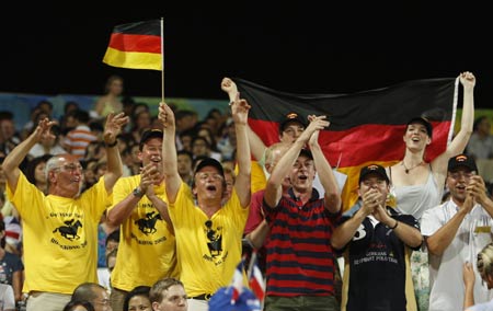Supporters of Germany sing after Germany won the equestrian eventing team competition at the Beijing 2008 Olympic Games in Hong Kong August 12, 2008, [Reuters]